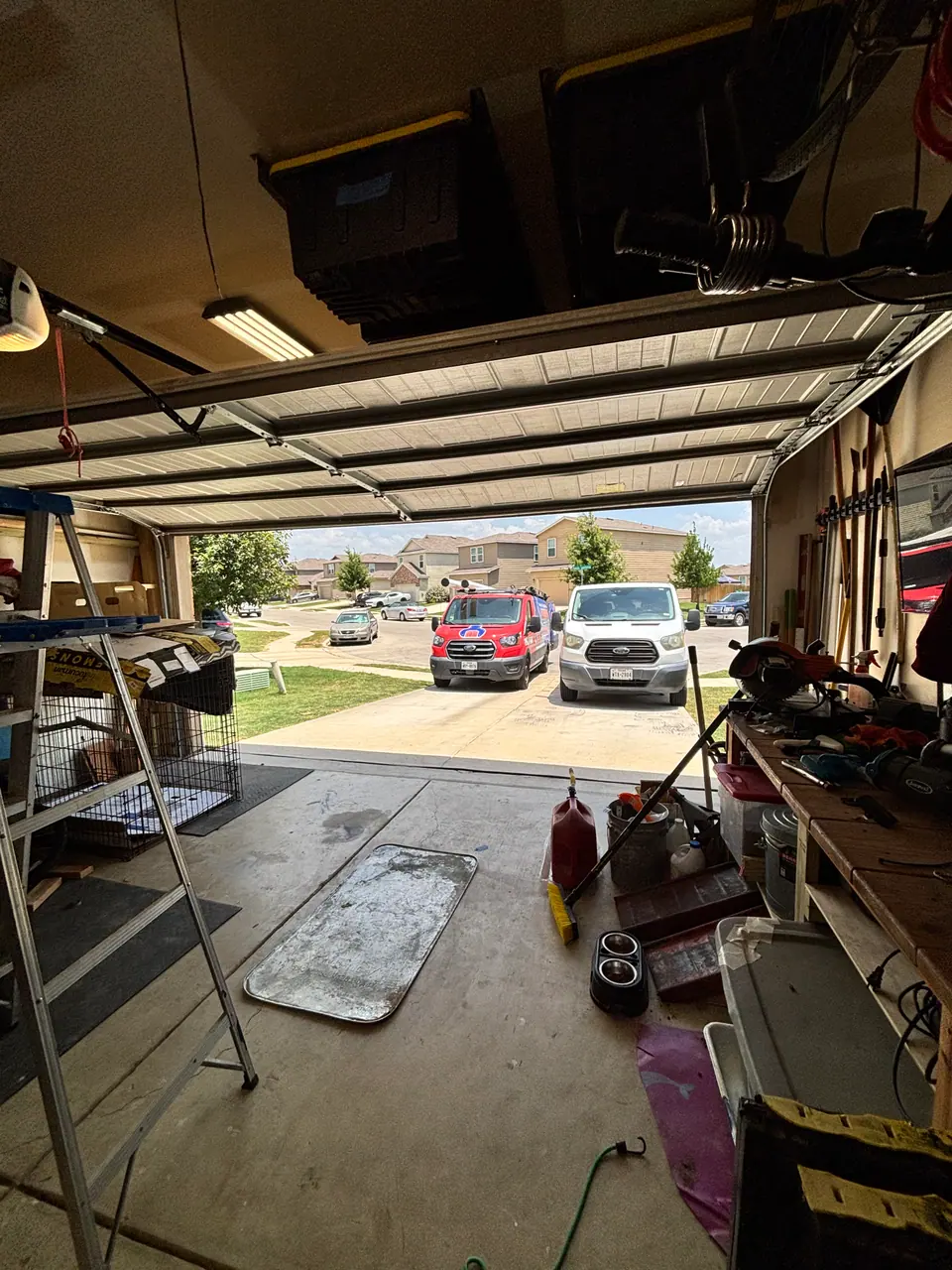 Garage door track during repair in New Braunfels