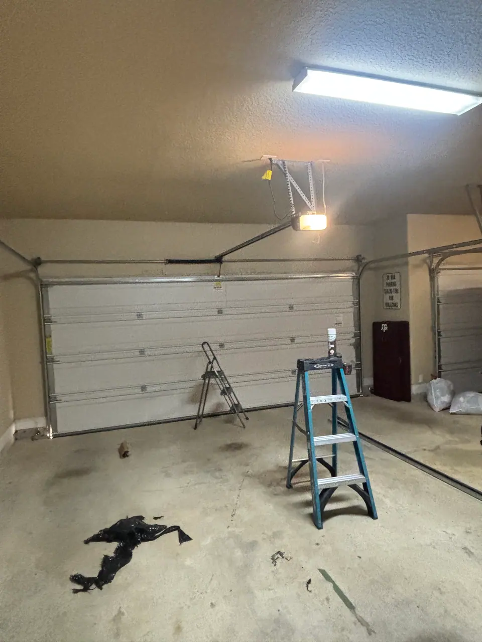 Garage door opener rail replacement project in New Braunfels