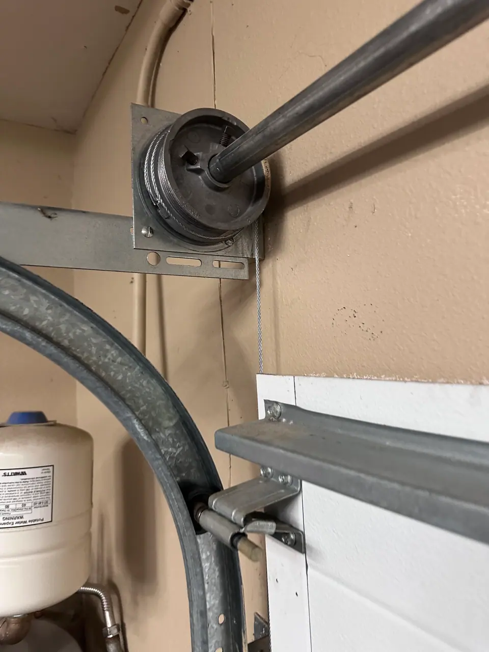 Garage door spring and cable replacement project in Stone Oak